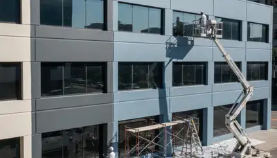 Professional commercial painting contractors working on Albany NY office building exterior